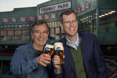 Boston Beer Co. founder Jim Koch (left) and Red Sox chief executive Sam Kennedy toasted over the new deal.
